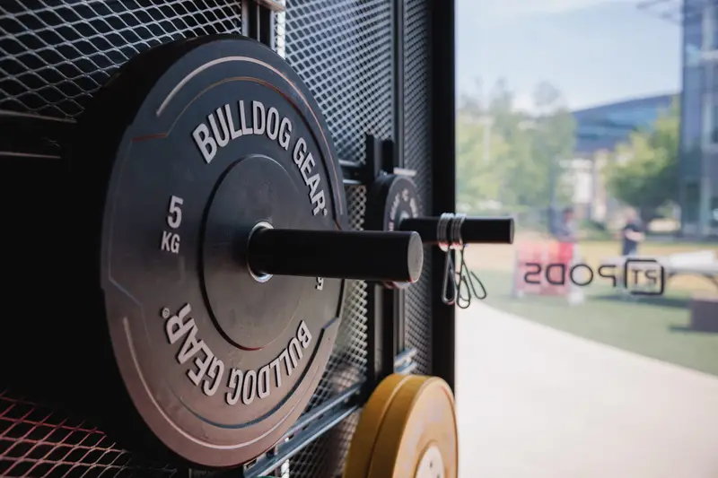 Bulldog Gear weight plates inside the PT Pod at ARC Uxbridge