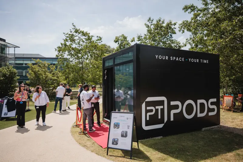 Occupiers gathering around a PT Pod at the ARC Uxbridge launch event